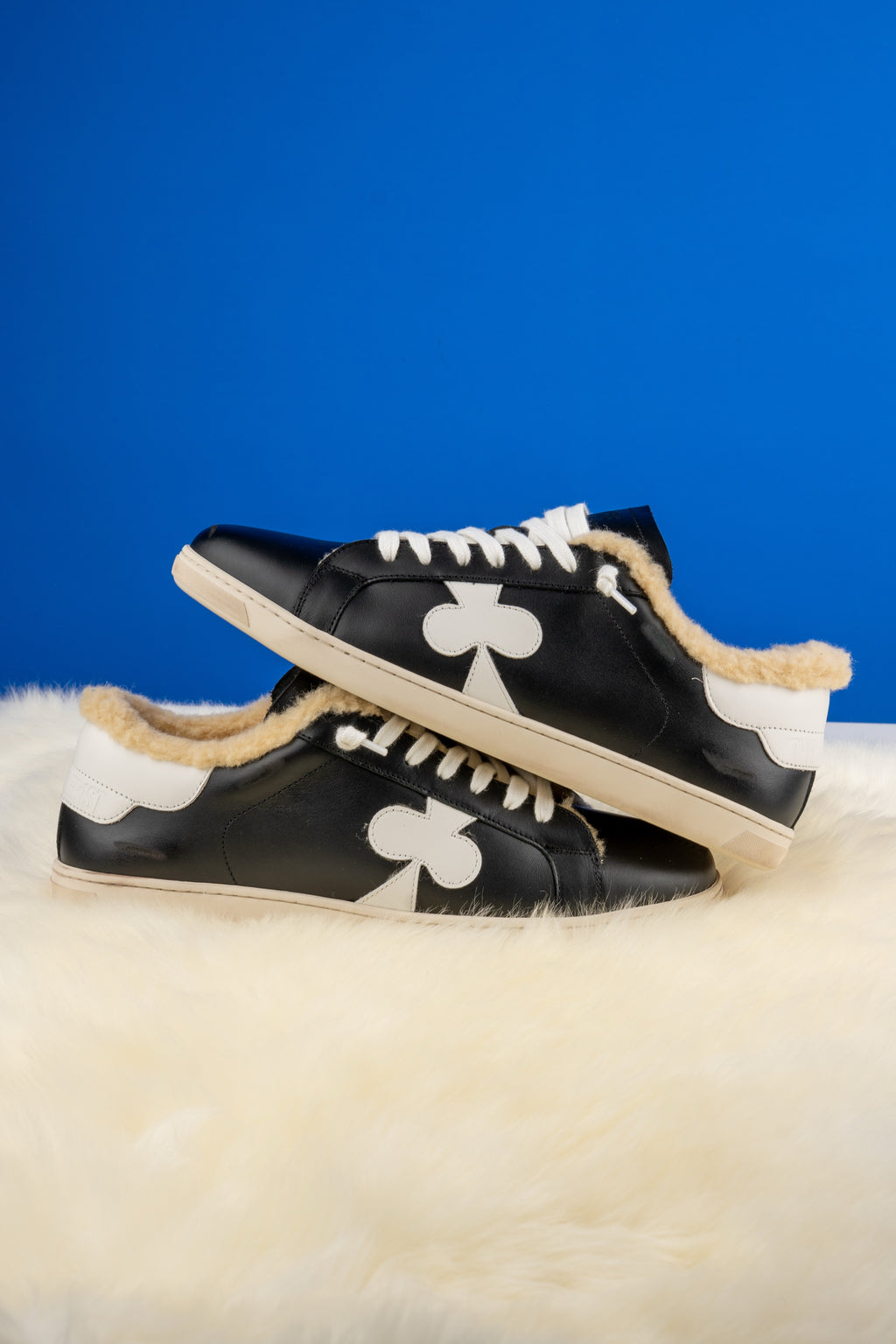 Geneva Wool Black and White, pair stacked on sheepskin