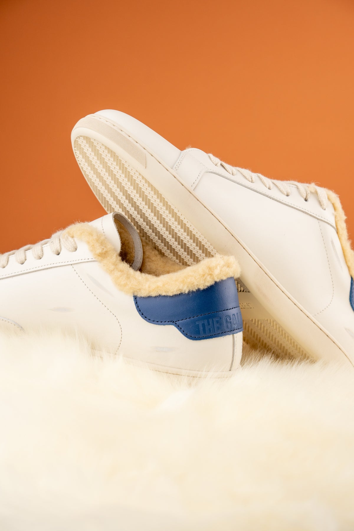 Geneva Wool Navy Heel Unsigned, pair on sheepskin, sole detail