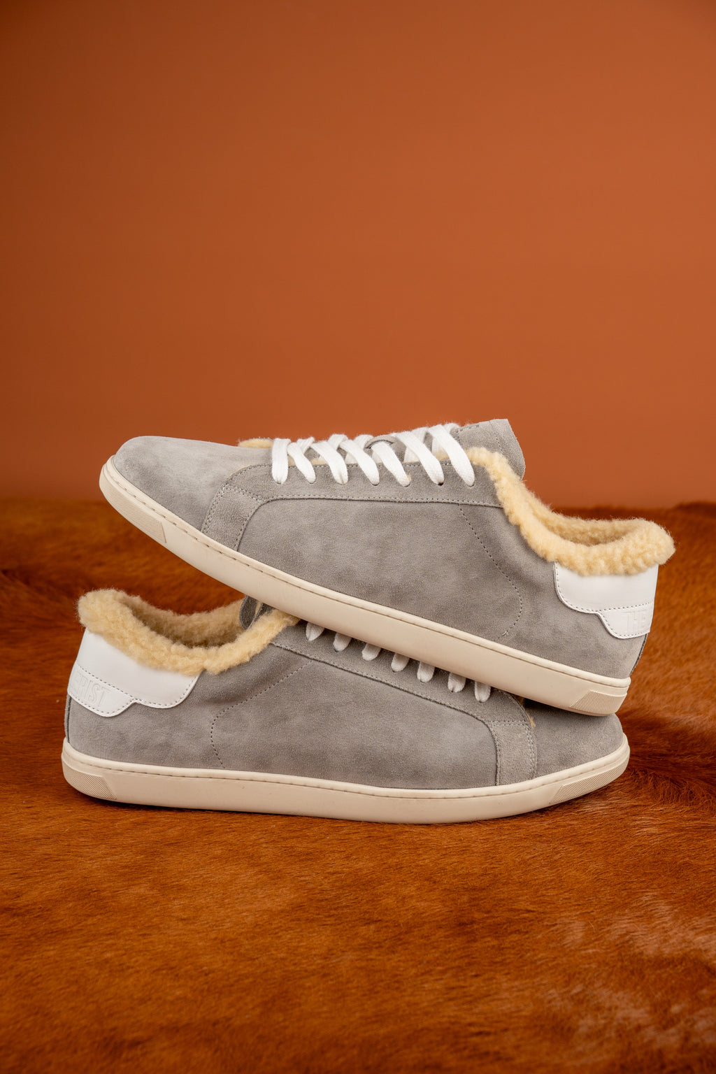 Geneva Wool Grey Suede Unsigned, pair stacked on cowhide