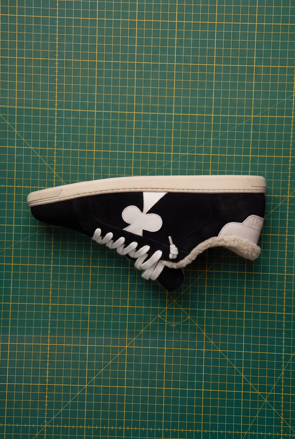 Geneva Wool Black Suede, side view with shearling lining