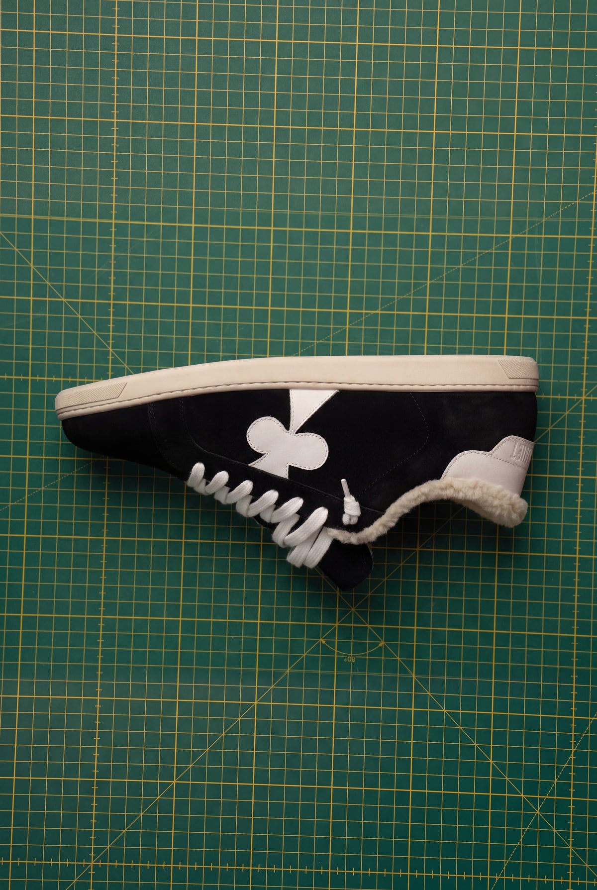 Geneva Wool Black Suede, side view with shearling lining
