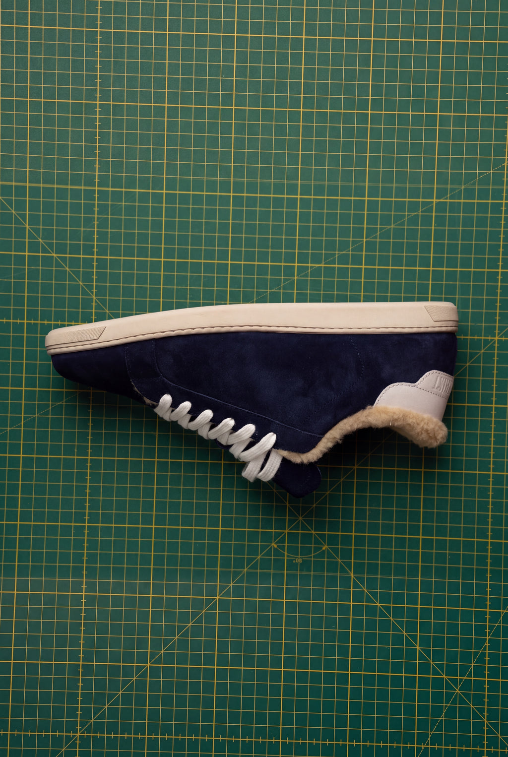 Geneva Wool Dark Blue Unsigned, side view with shearling lining