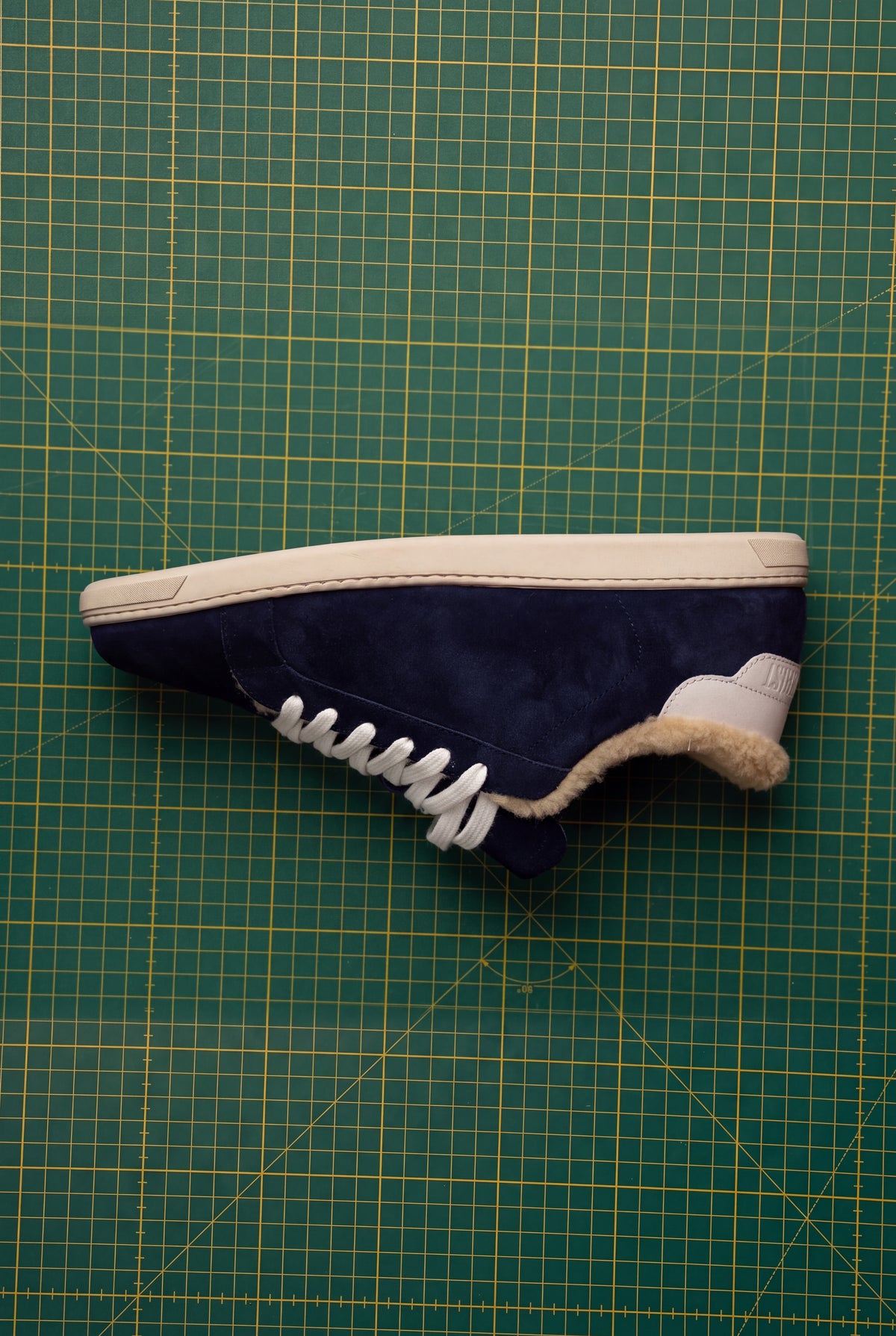 Geneva Wool Dark Blue Unsigned, side view with shearling lining