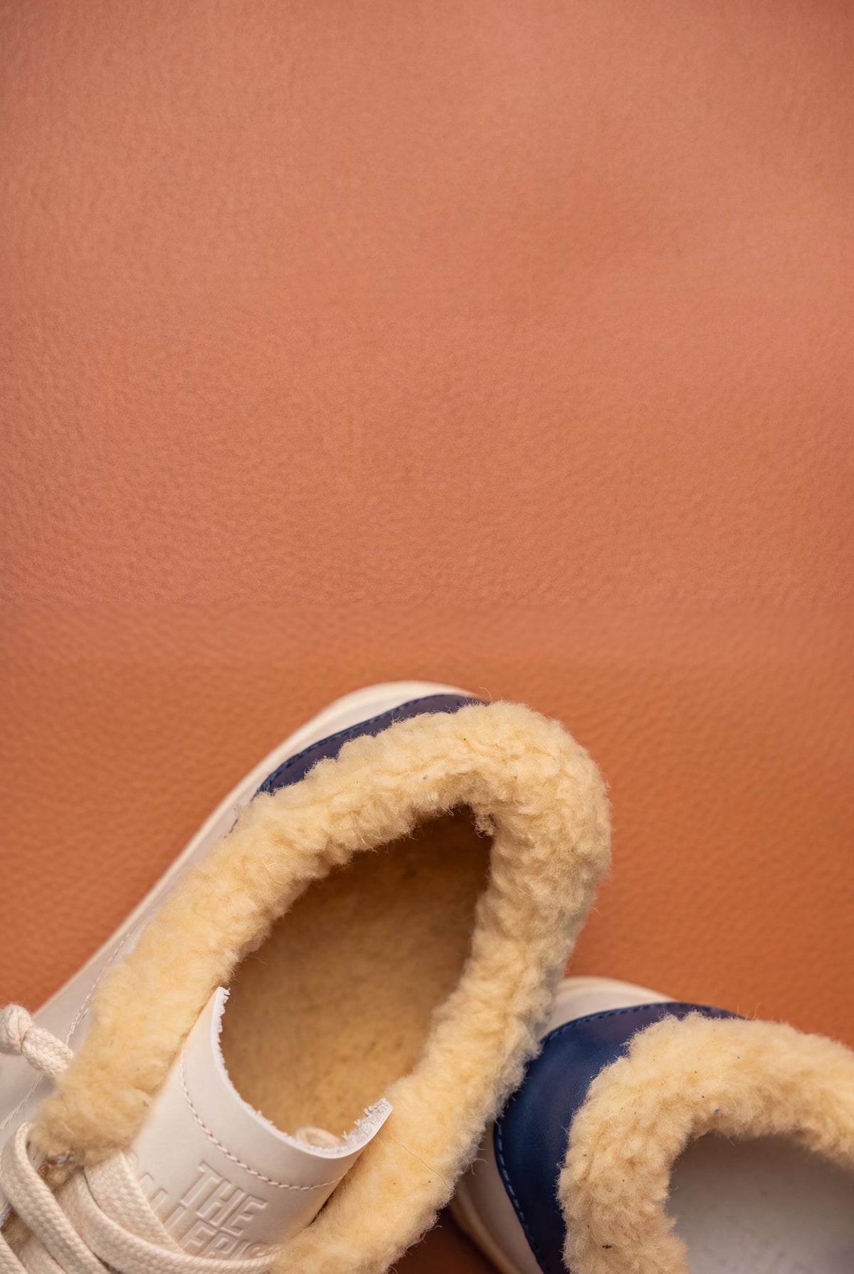 Geneva Wool Navy Heel, close-up of the full shearling lining